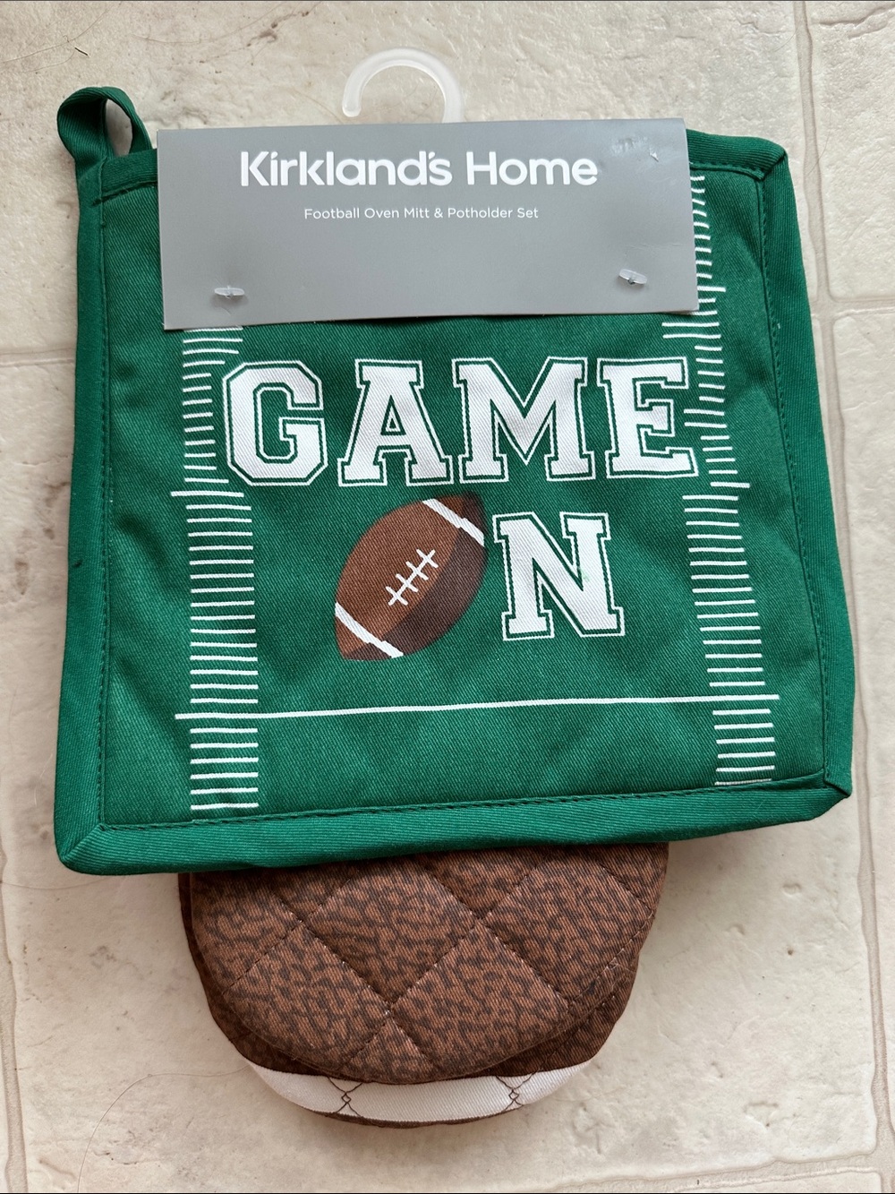 Kitchen football-themed oven mitt and potholder